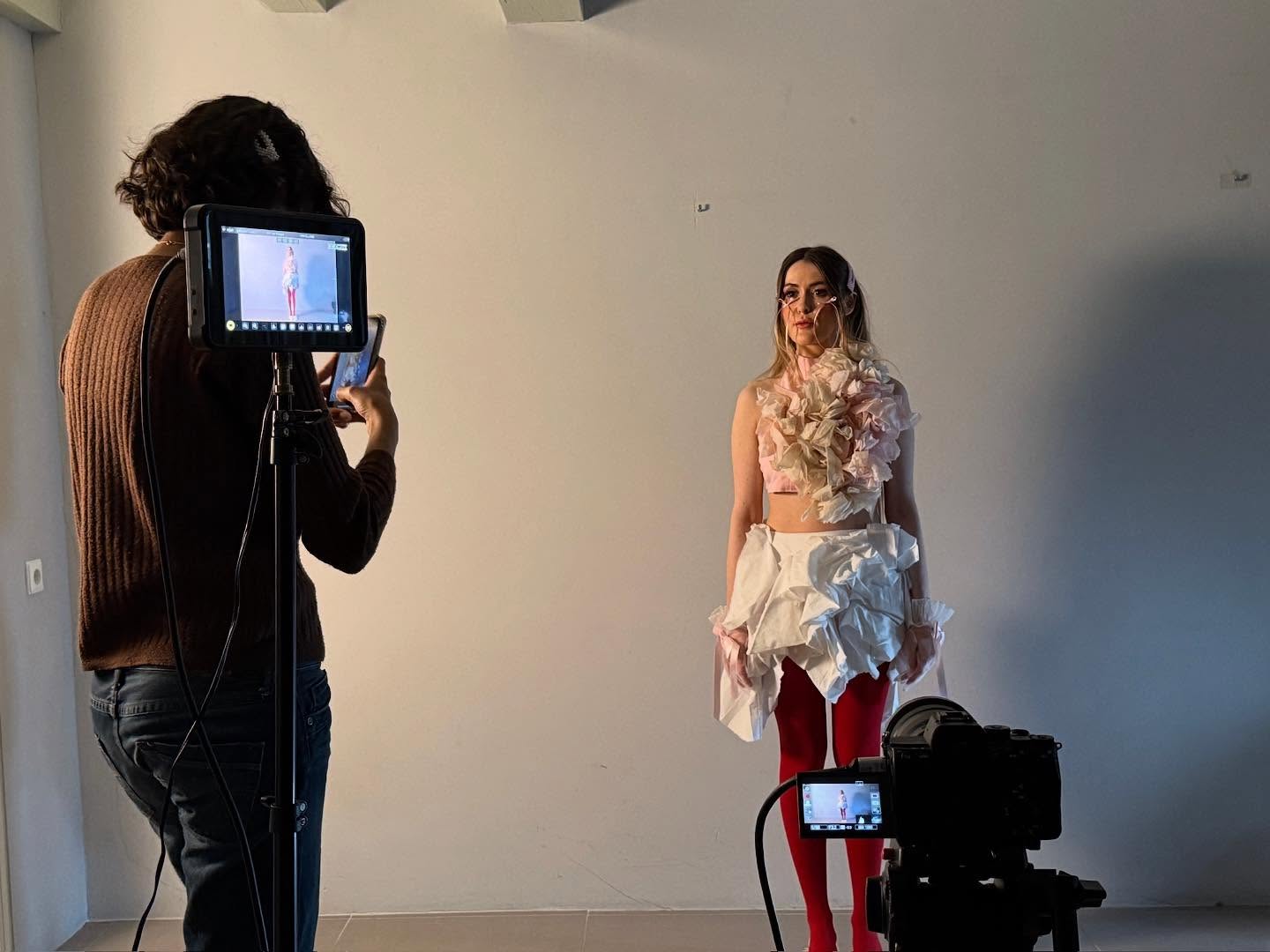 Behind the scenes: the DOP filming Dalia against the grey backdrop