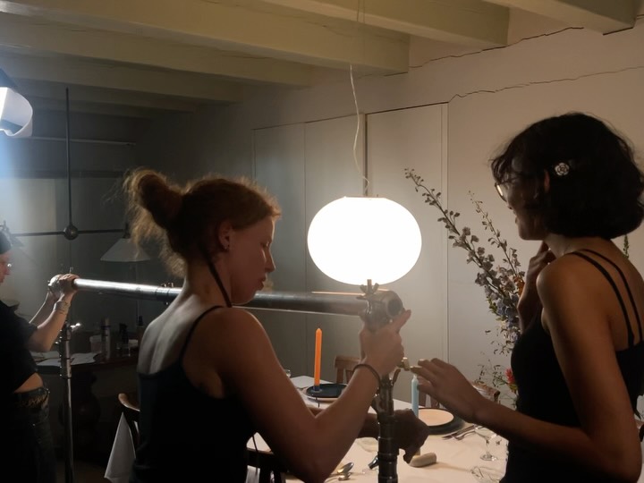 Behind the scenes: lighting the dining table by candle and lantern